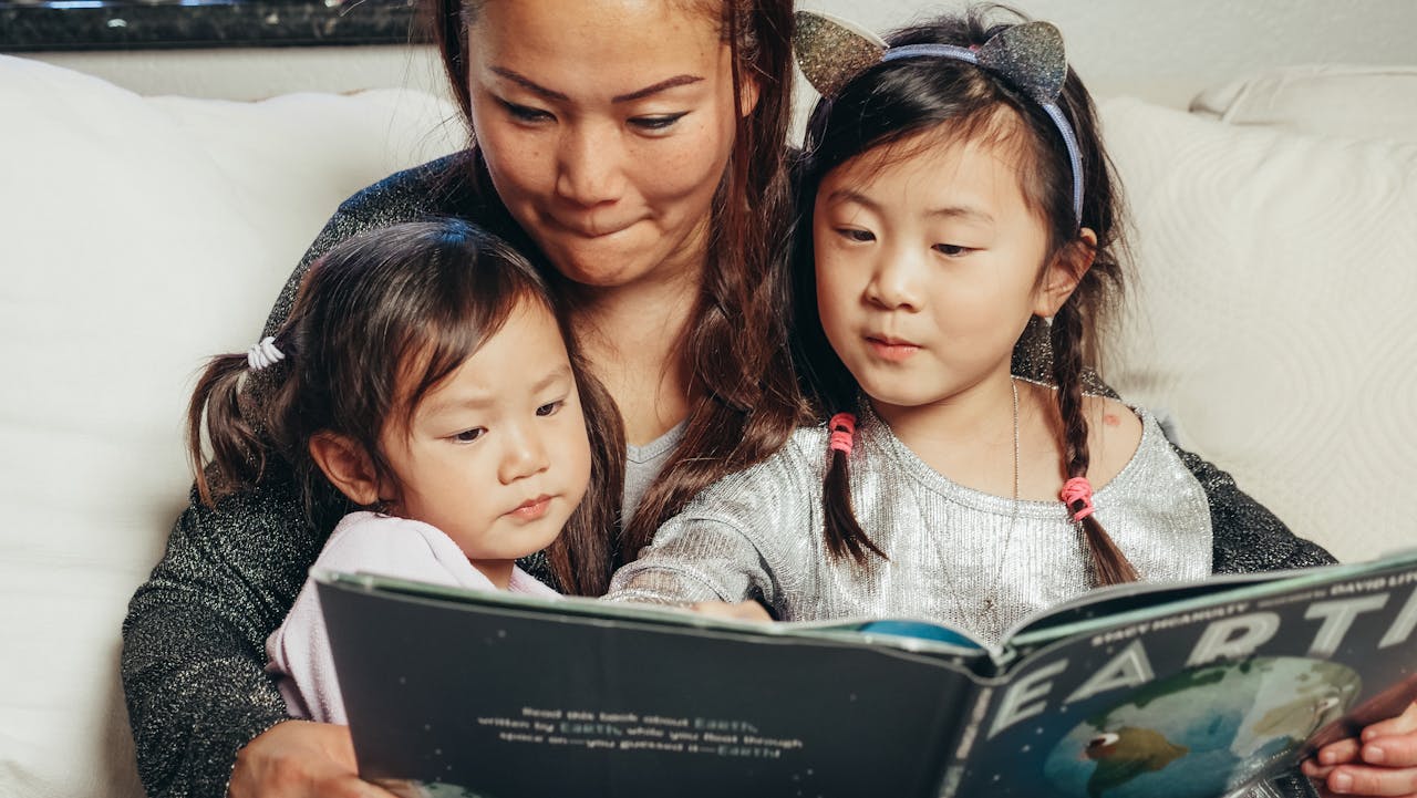 Asian mom reading with child - what to do during study time